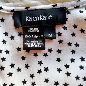 Karen Kane Black Star Pattern Top